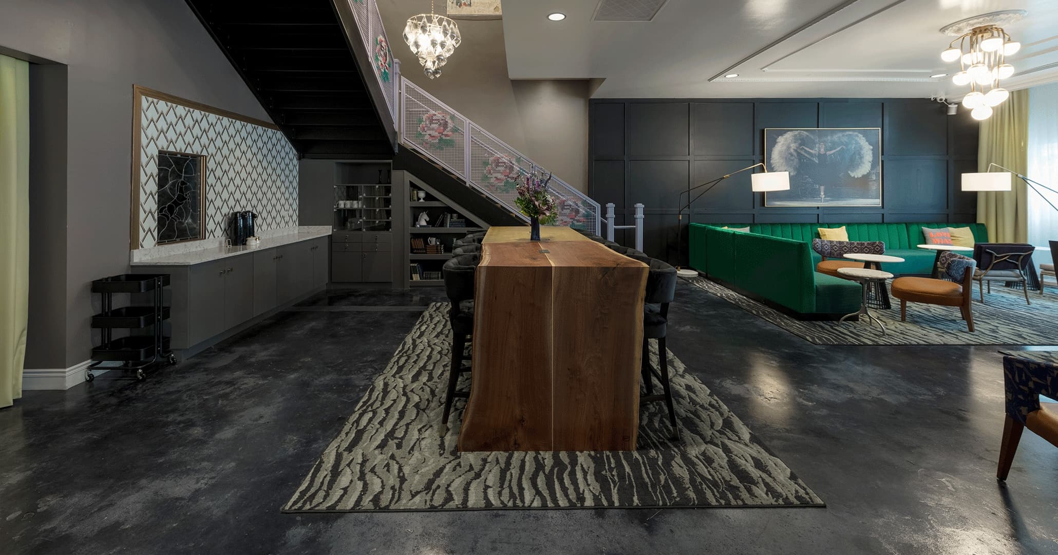 Boudreaux architects kept architectural details from the historic buildings and created a modern boutique Hotel.